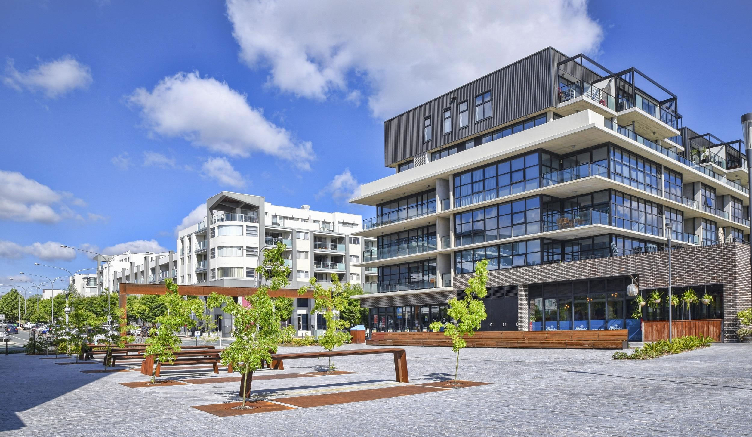 Modern building representing Driccher portfolio growth